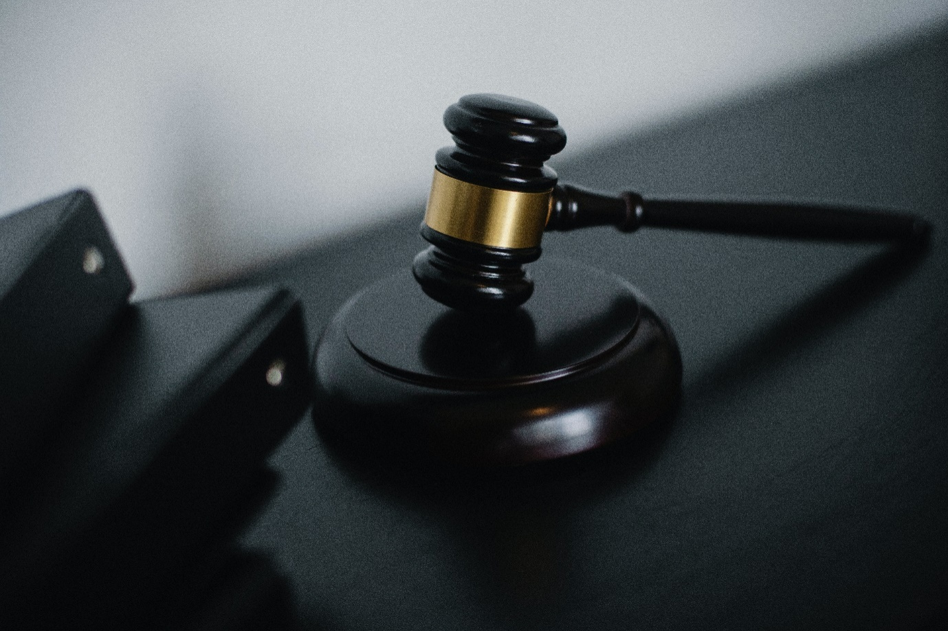 A gavel placed on a judge's table 